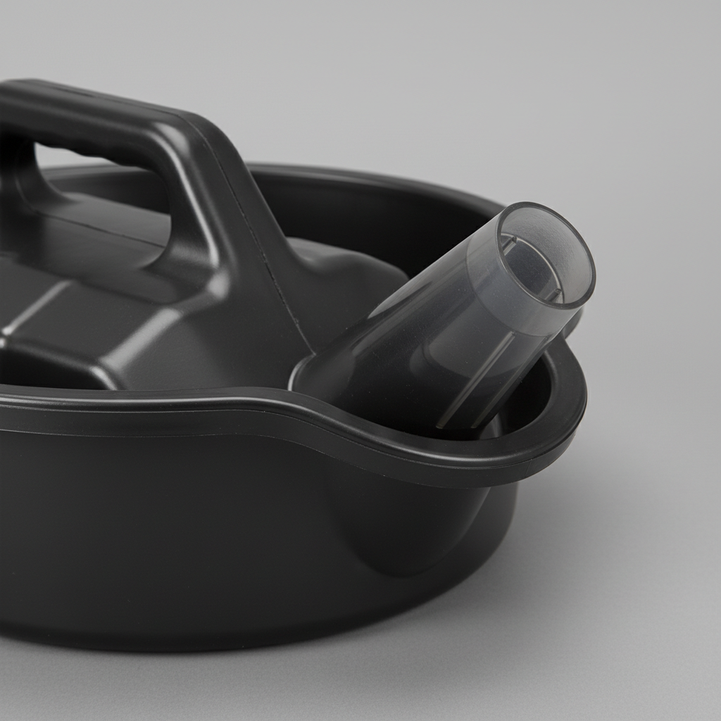 Close-up of spout design on an oil drain pan showing tapered pour lip